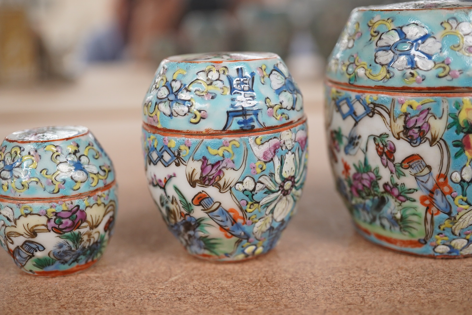 A complete Chinese porcelain nest of five enamelled porcelain barrel shaped boxes, c.1900, largest 12cm high. Condition - fair, some minor chipping